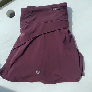 Barley worn maroon Lululemon skirt